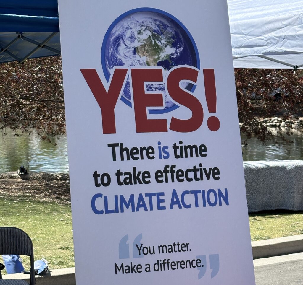 sign that read: yes! there is time to take effective climate action.