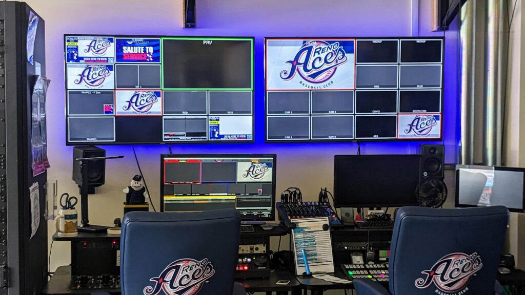 room with television monitors with Reno Aces logo