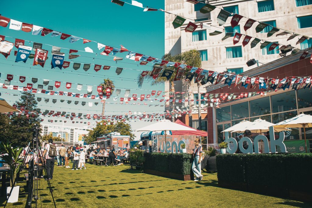 green space with small flags and Ueno Bank stand