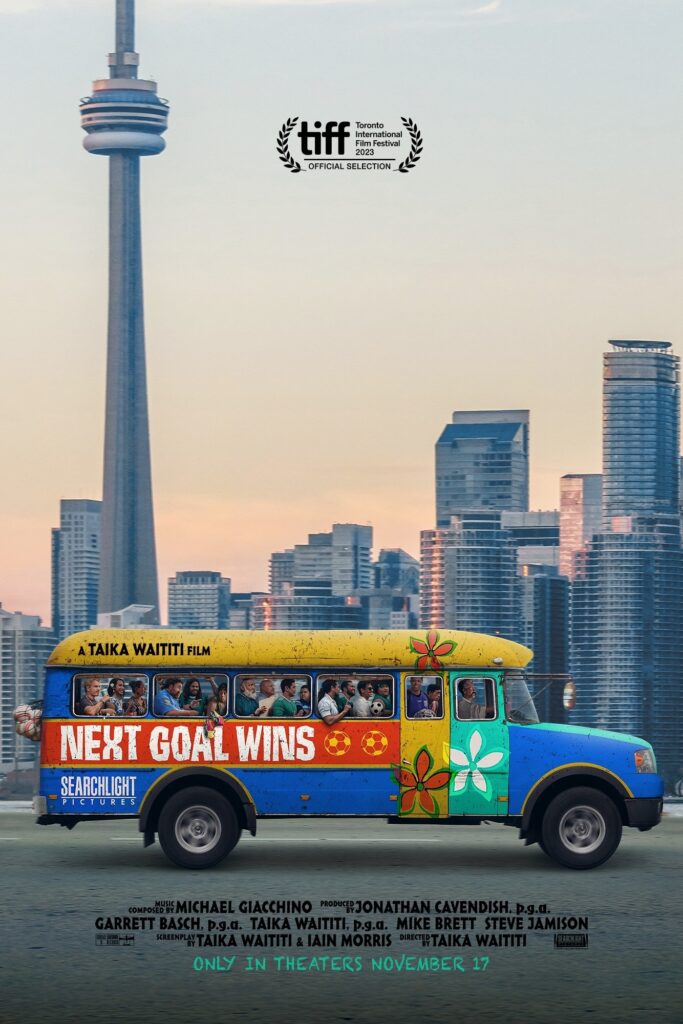 school bus in front of city skyline