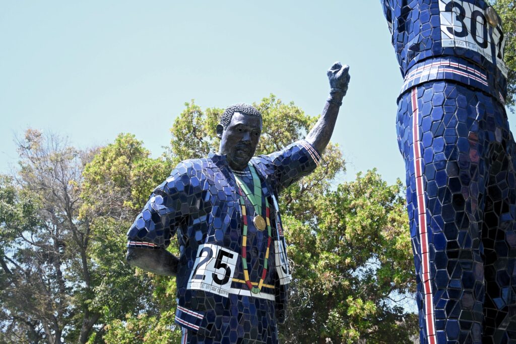 statue of a man with his fist raised