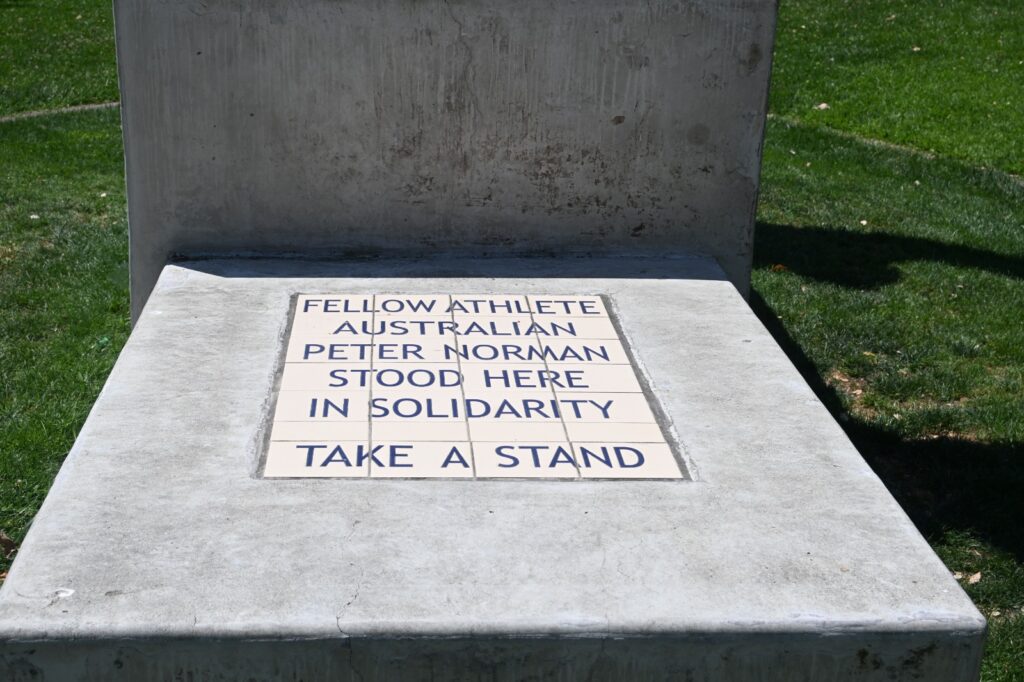inscription on the base of a statue