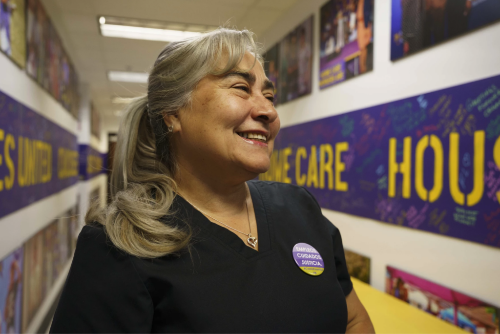 woman smiling in hallway