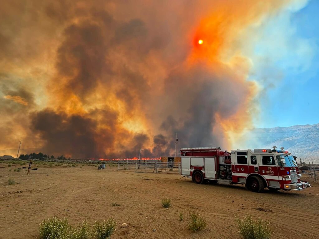 Large flames in background