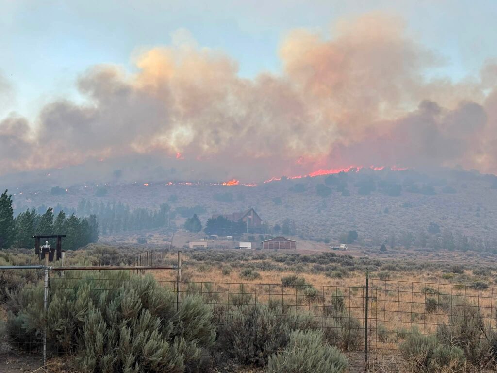 flames burn on hillside