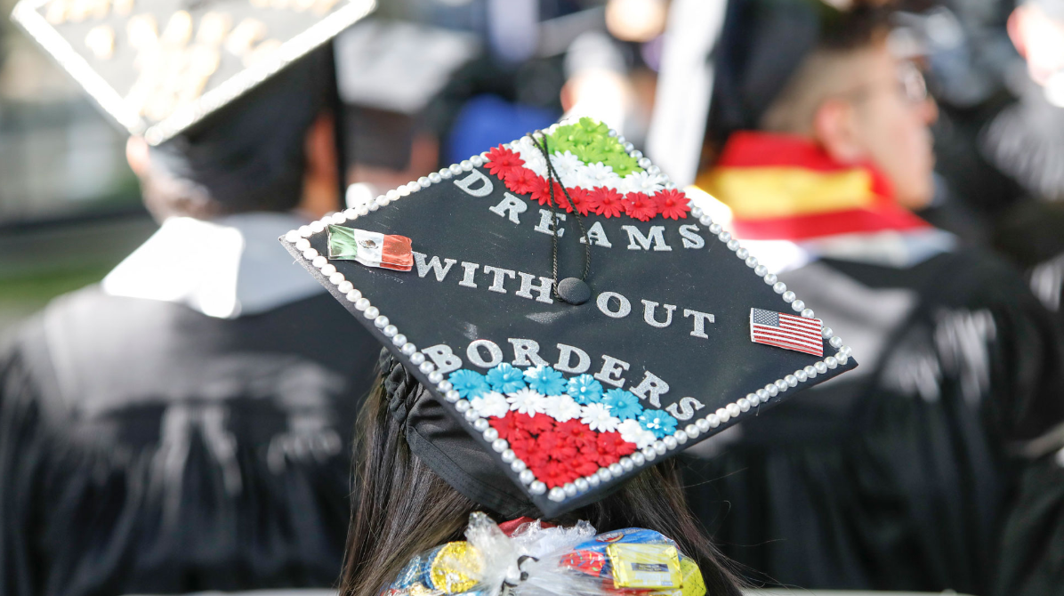 Graduation cap decorated with words "Dreams Without Borders"