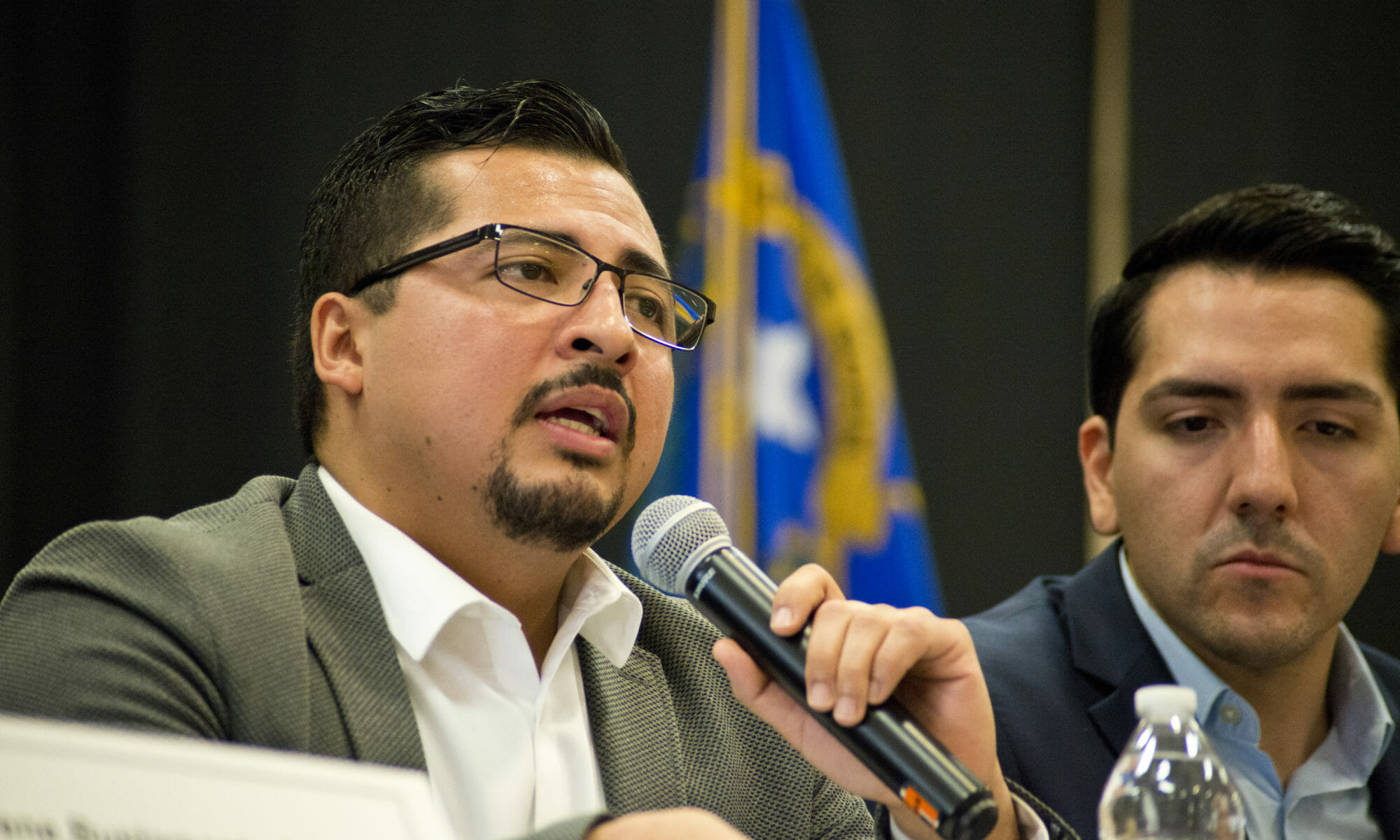 Nevada Assemblyman Edgar Flores speaking into microphone