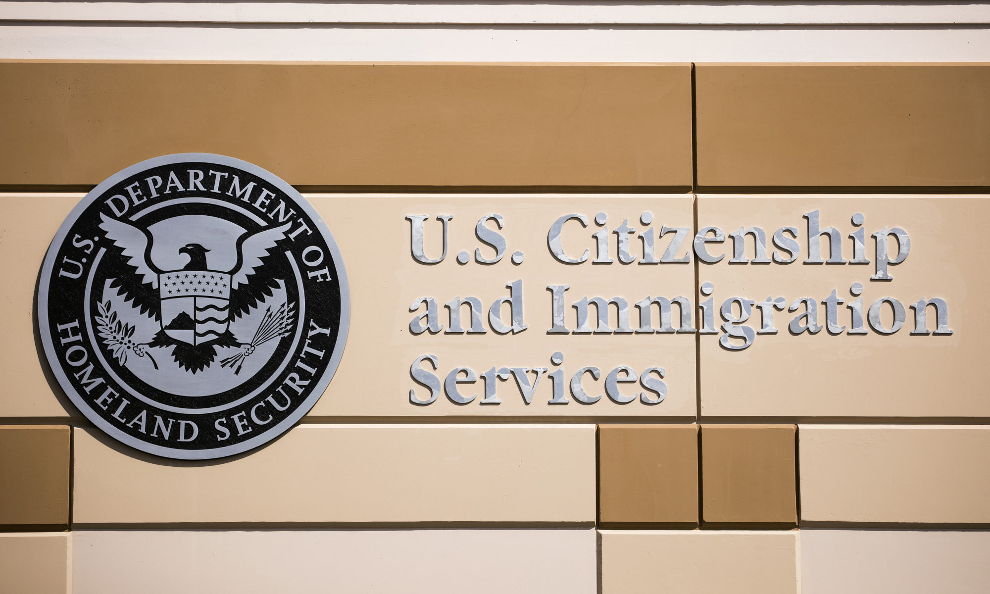 Emblem at a U.S. Citizenship and Immigration Services building