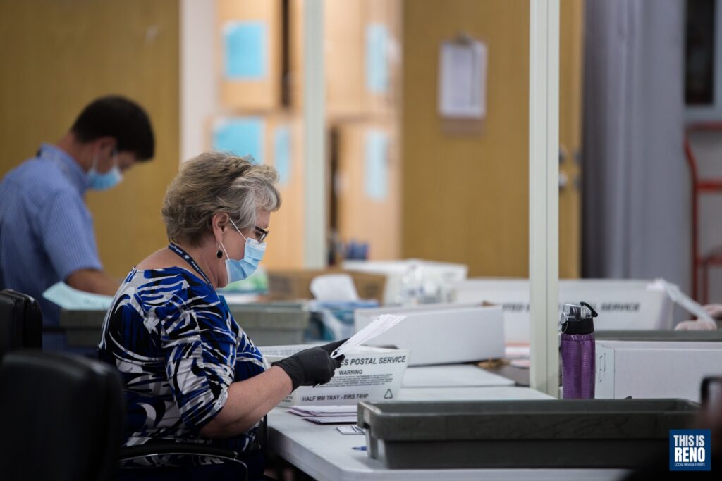 A Washoe County employee counts June 2020 primary election ballots.