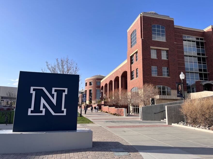 The Nevada university logo is shown in front of the library in Reno