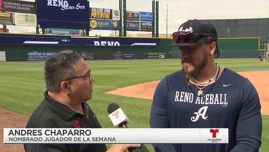 Telemundo reporter interviews Andres Chaparro