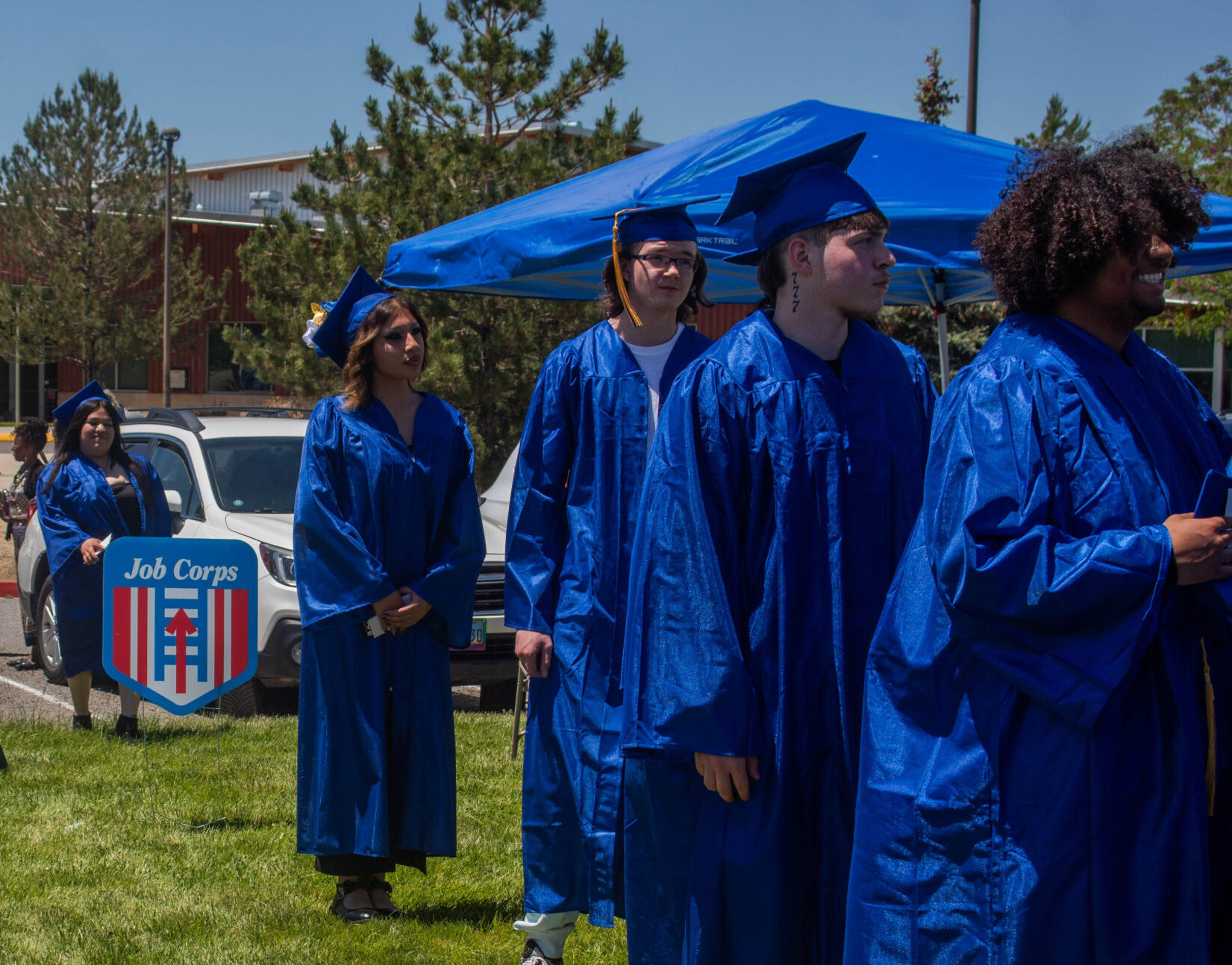 graduating students in blue robes