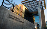 entrance to gray courthouse building