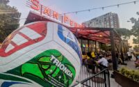 gigantic soccer ball outside of trendy market