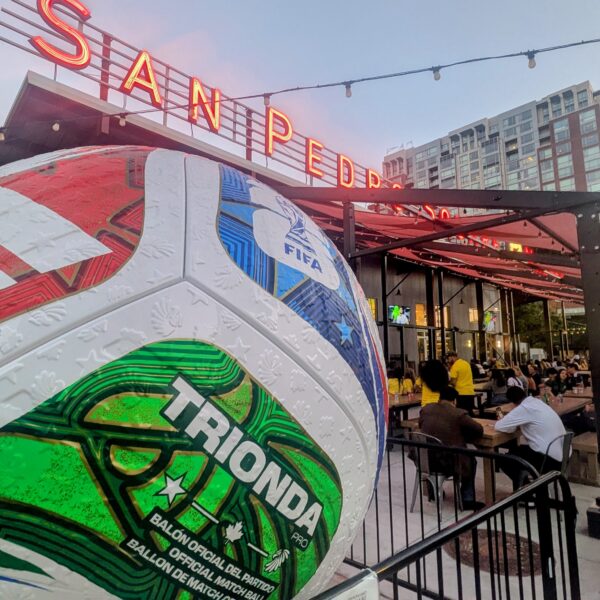 gigantic soccer ball outside of trendy market