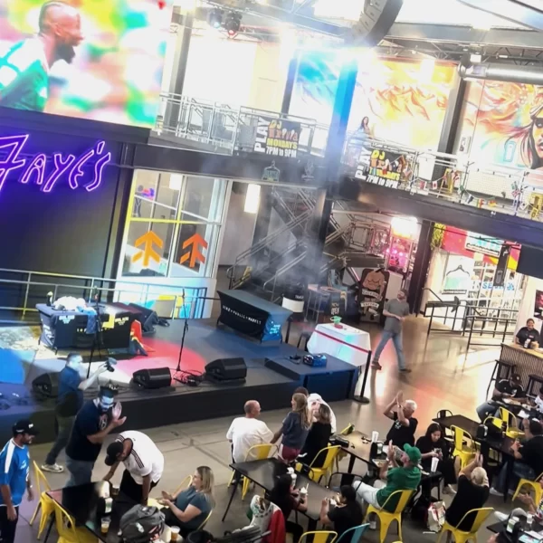 aerial view of people seated watched big television