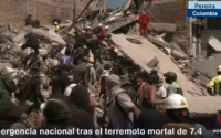 people digging through rubble